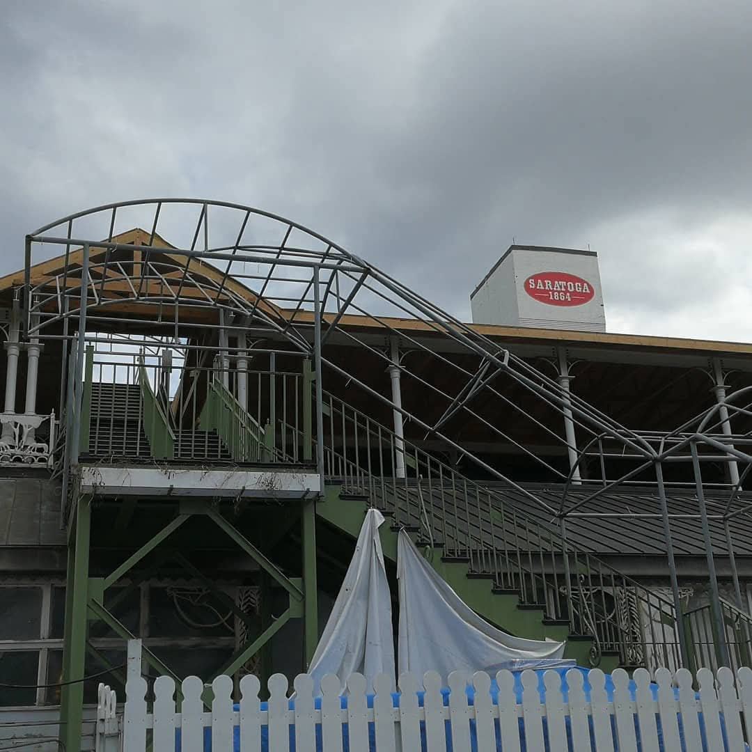 Exterior stairs at Saratoga Race Course with the Saratoga 1864 sign